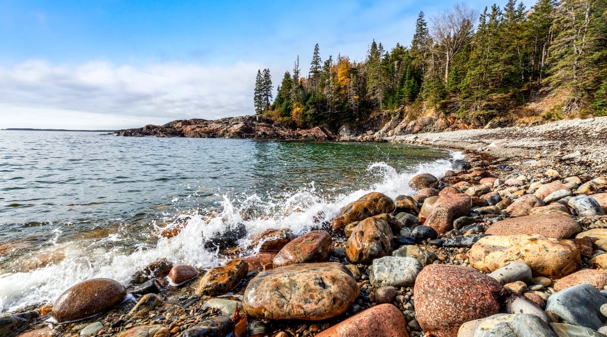 Little Hunters Beach is a small secluded beach located in Acadia National Park in Maine, USA. The beach is surrounded by cliffs and dense forests. Little Hunters Beach is known for its scenic beauty, crystal clear waters and stunning views of the surrounding landscape.