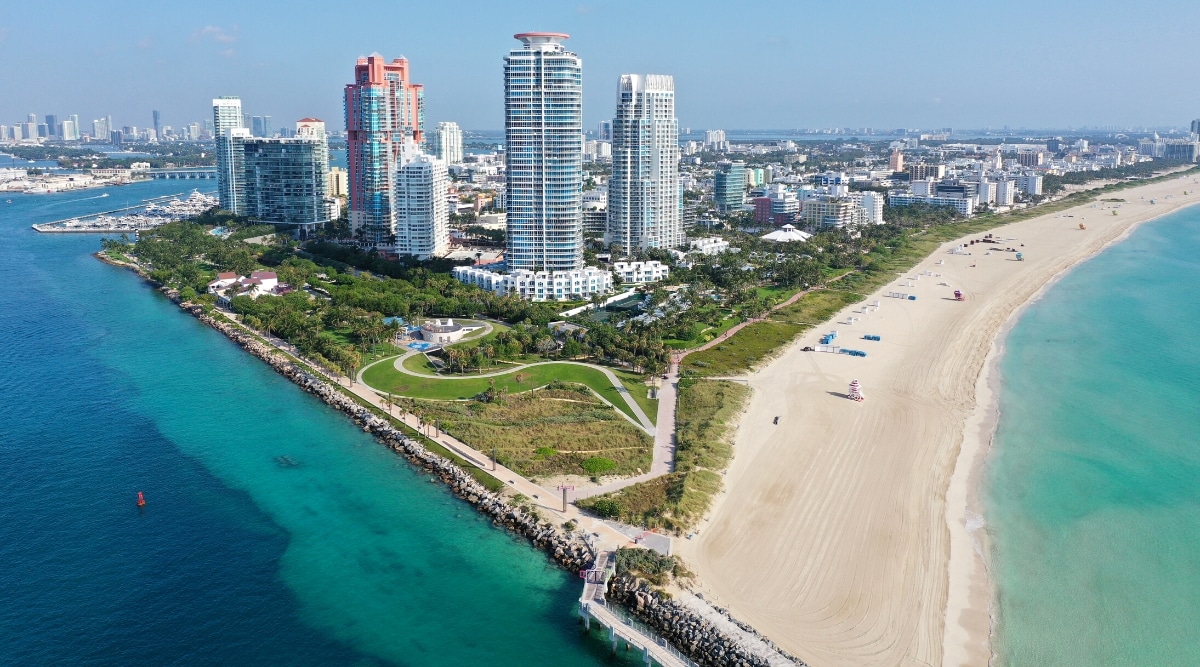 South Beach is a vibrant and trendy neighborhood in Miami Beach known for its iconic Art Deco architecture and white sand beaches. It is a popular tourist destination with many restaurants, bars and shops along Ocean Drive and Lincoln Road.