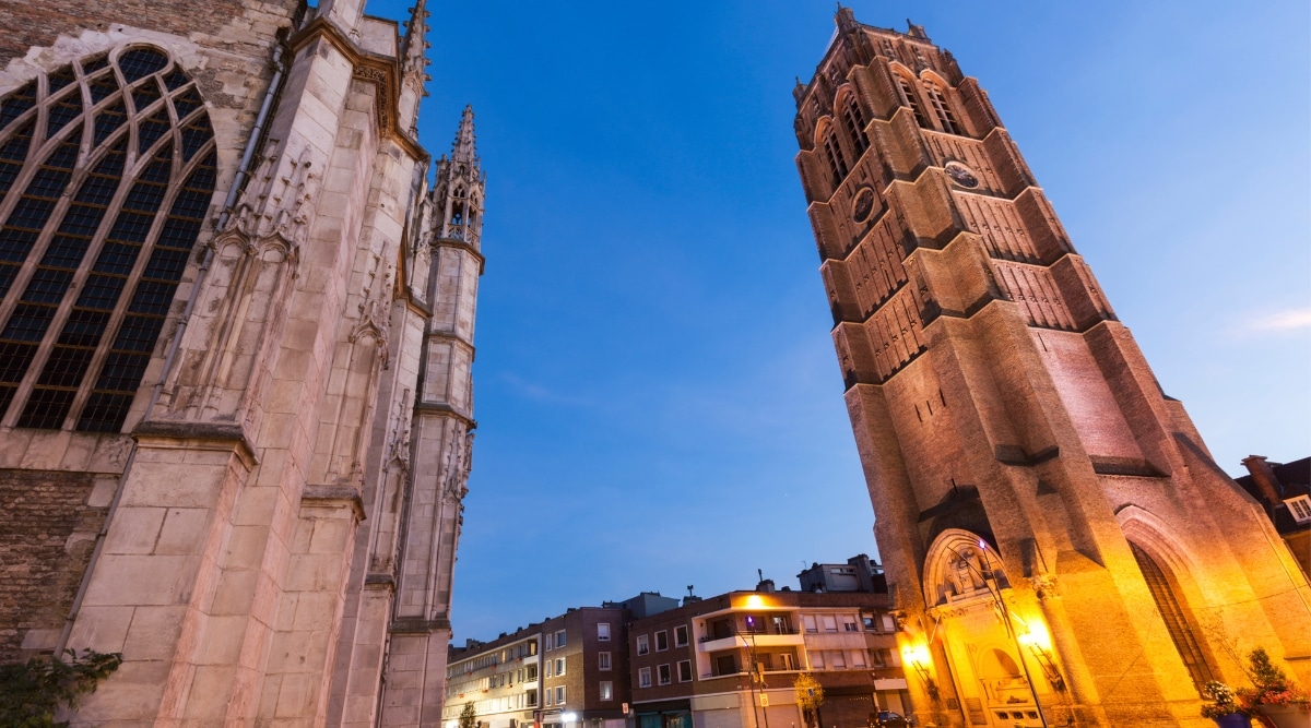 The belltower at the Saint Eloi Church in Dunkirk France, photographed from below at dusk.