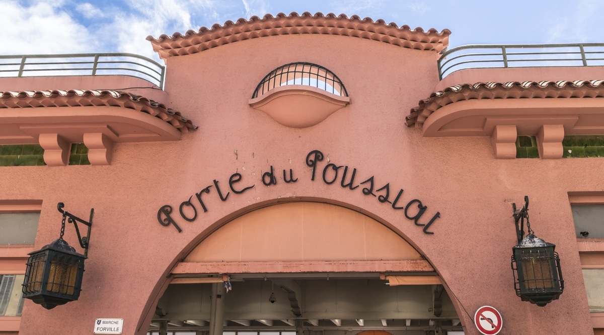The entrance sign to the Marche Forville marketplace in Cannes France on a clear sunny day.