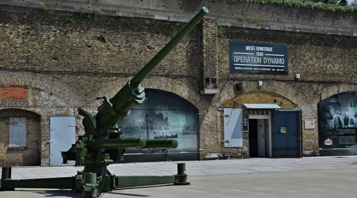 Dunkirk Museum entrance with a giant WWII cannon mounted out front.