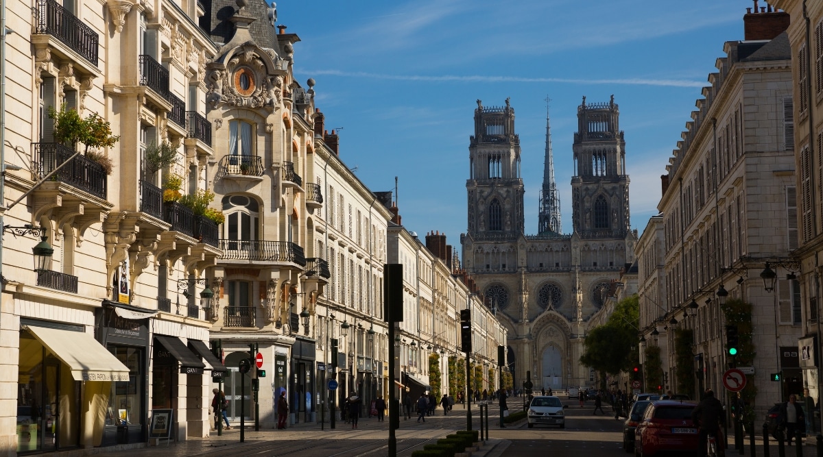 Summer view of the Orleans Cathedral illustrating the old style architecture from the local buildings and establishments in Orleans France.