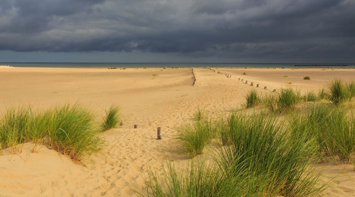 The infamous Plage de Malo-les-Bains, deserted, on a cloudy day in Dunkirk, France.
