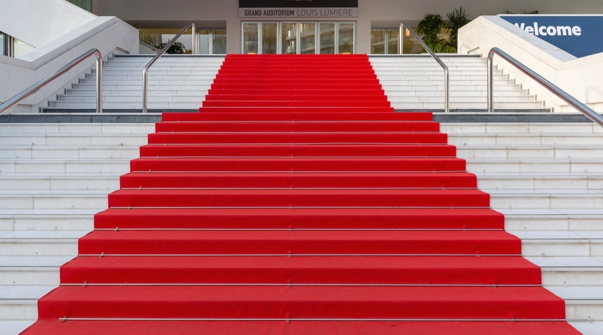 The red carpet looking up the steps to the Grand Auditorium in Cannes France.