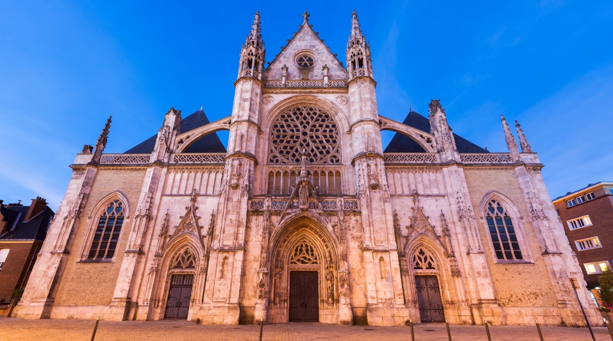 The Eglise Saint-Eloi Cathedral in Dunkirk France, photographed from the entrance at dusk.