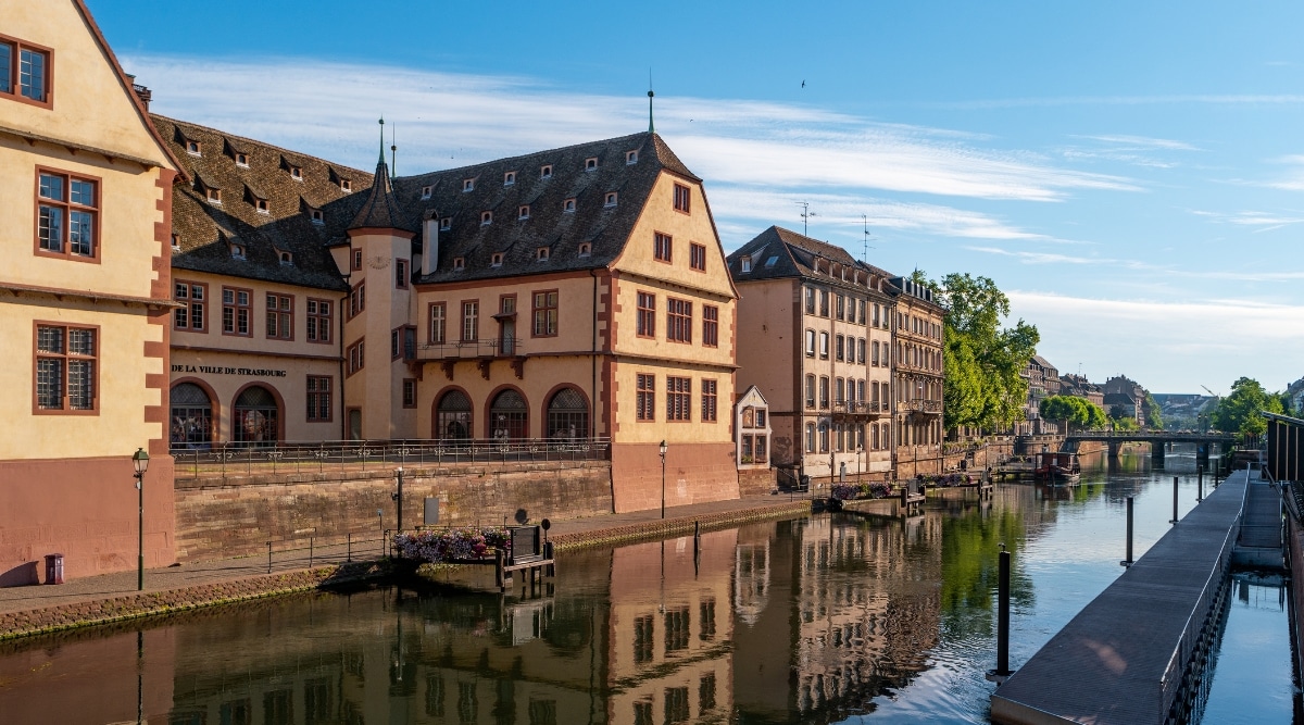 Exterior of the Musee Historique de Strasbourg in Strasbourg France, along the Ill River on a clear summer day.