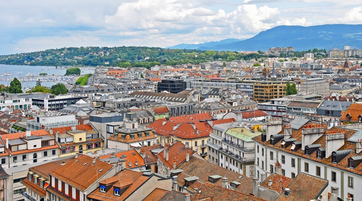 A sweeping aerial view captures the cityscape of Geneva, a city that gracefully straddles the border of Switzerland and France. The architecture seamlessly blends the charm of the old with the modern, creating a captivating urban tapestry.
