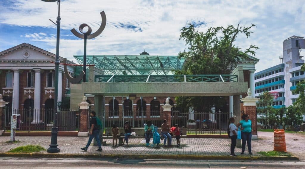 A photograph featuring the Museo de Arte Contemporaneo in Puerto Rico. The building exhibits contemporary design elements and is situated in a urban setting. The landscaping around the museum appears well-maintained.