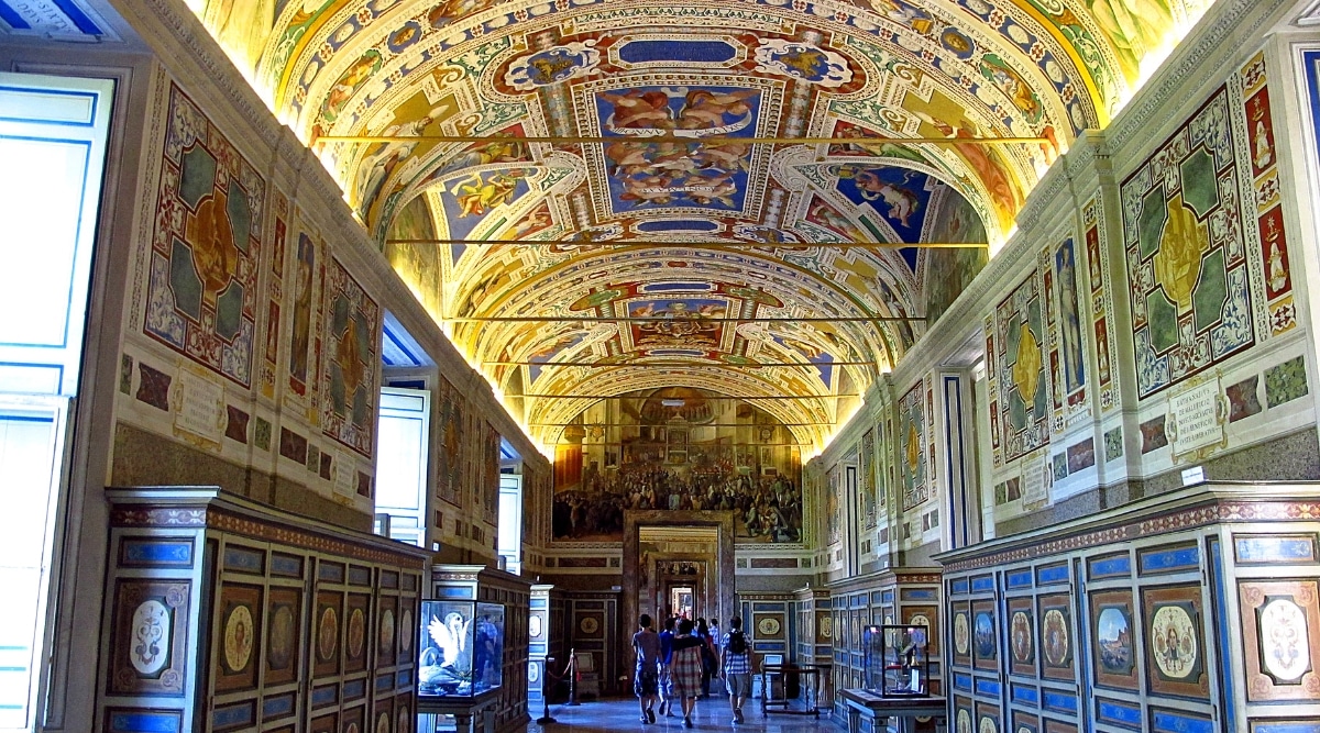 Vatican Museums in Vatican City. The image unfolds a rich tapestry of art and culture, featuring opulent galleries adorned with intricate frescoes, classical sculptures, and ornate architecture. 