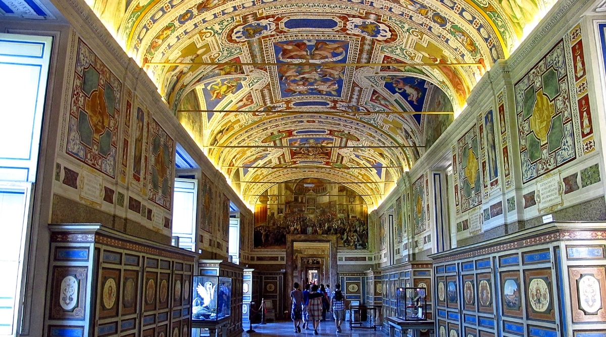 Vatican Museums in Vatican City. The image unfolds a rich tapestry of art and culture, featuring opulent galleries adorned with intricate frescoes, classical sculptures, and ornate architecture.
