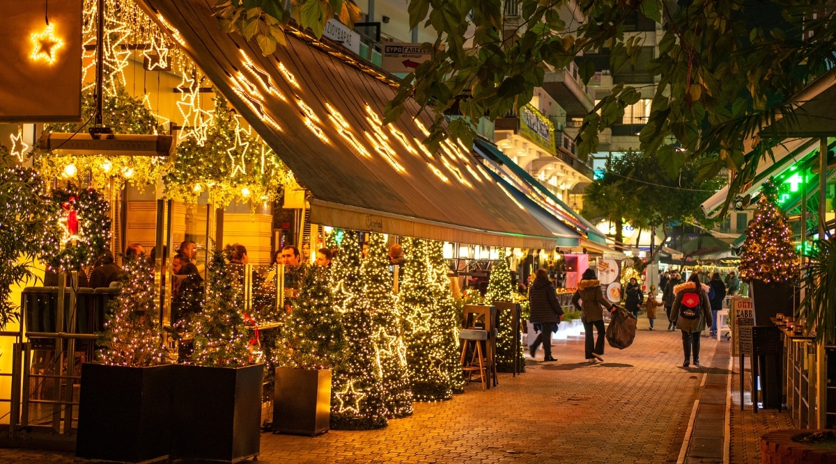 A photograph capturing the adorned pedestrian streets during Solvang's Julefest in Los Angeles. The image showcases the festive decorations lining the streets, featuring lights and seasonal embellishments.