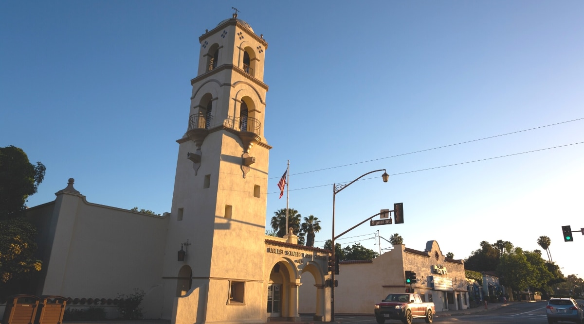 The Ojai Post Office Tower and Portico, completed in 1917, depicted in this image from Ojai, California. The photograph showcases the historical architectural features of the post office, including the tower and portico.