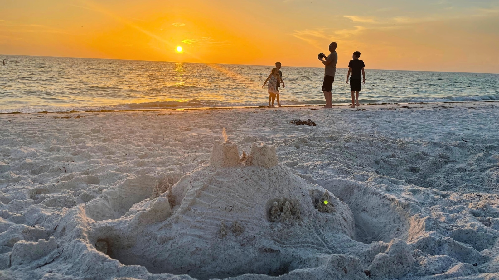 Family Enjoying Vacation on Florida Coastline