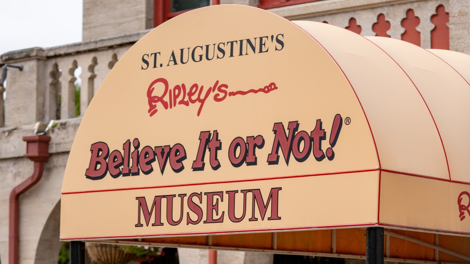 The image features a close-up of a sign bearing the words "St. Augustine Ripley’s Believe It or Not."