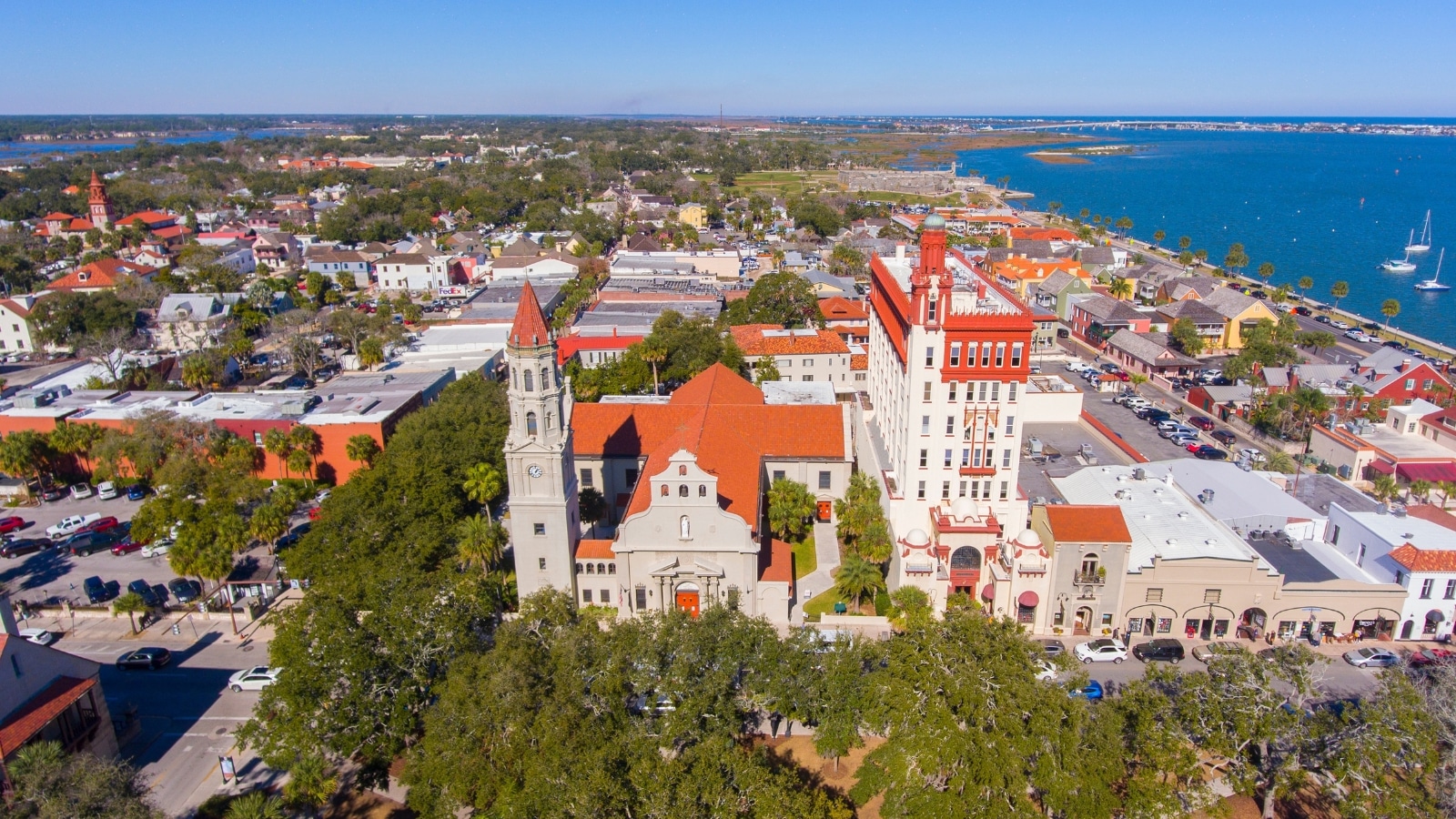 The image shows a top view of Basilica St. Augustine, presenting a bird's-eye perspective of the architectural structure. The basilica's distinctive features, such as its domes, spires, and intricate detailing, are clearly visible.