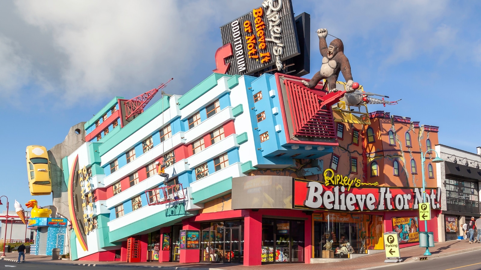 The image depicts the exterior of the "Ripley's Believe It Or Not" museum situated on Clifton Hill street in Niagara Falls, Ontario, Canada. The museum's facade features a distinctive and eye-catching design. The museum's signage is prominently displayed, contributing to the lively atmosphere of Clifton Hill.