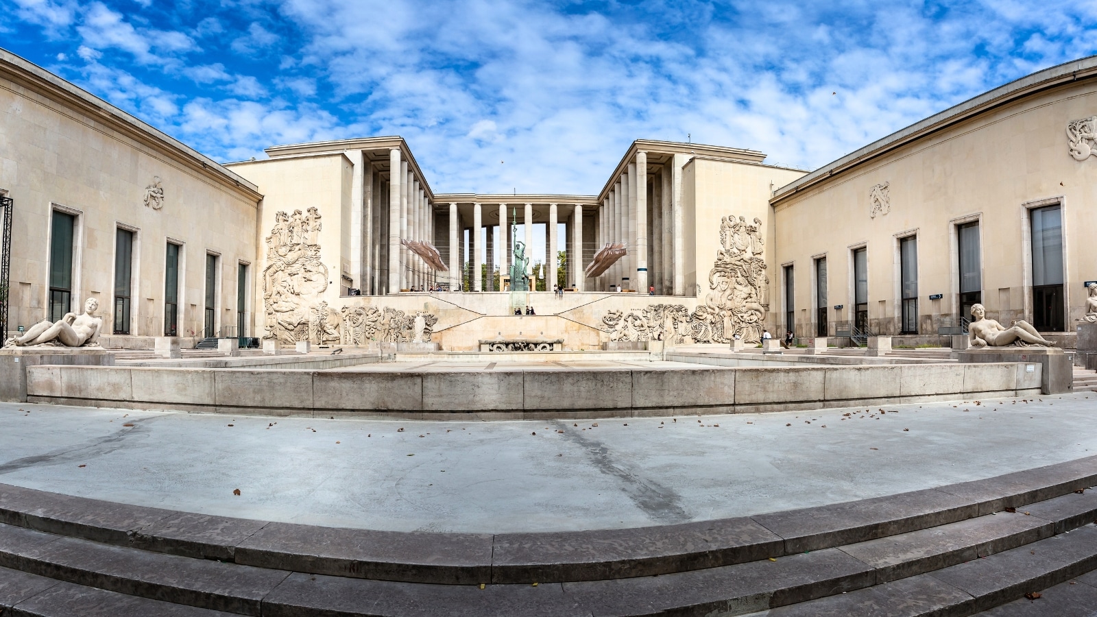 Museum of Modern Art in Paris, France. The museum's exterior showcases contemporary architectural elements, with a focus on clean lines and modern design. The building features geometric shapes and angular structures.