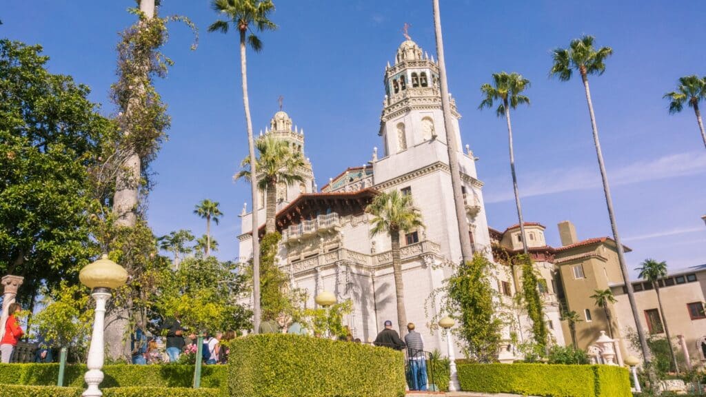 The image features the Casa Grande, which is the main building of Hearst Castle in San Simeon, California, USA.