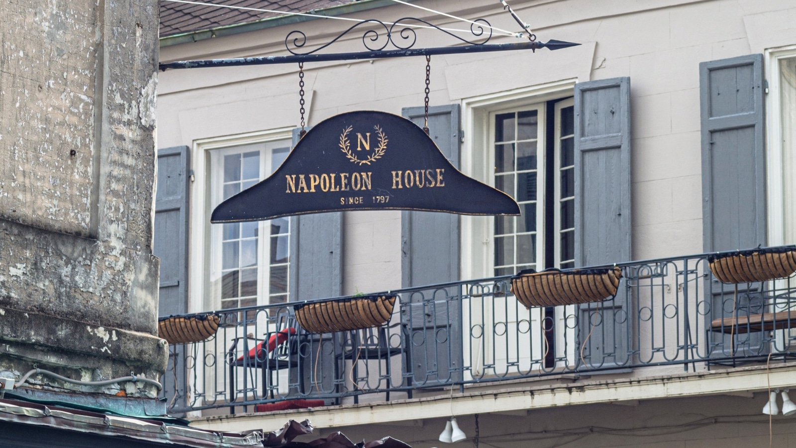 Napoleon House Bar and Restaurant on Chartres Street in the French Quarter of New Orleans is a notable landmark. The bar sign is shaped like Napoleon's cap and bears the text "Napoleon House."