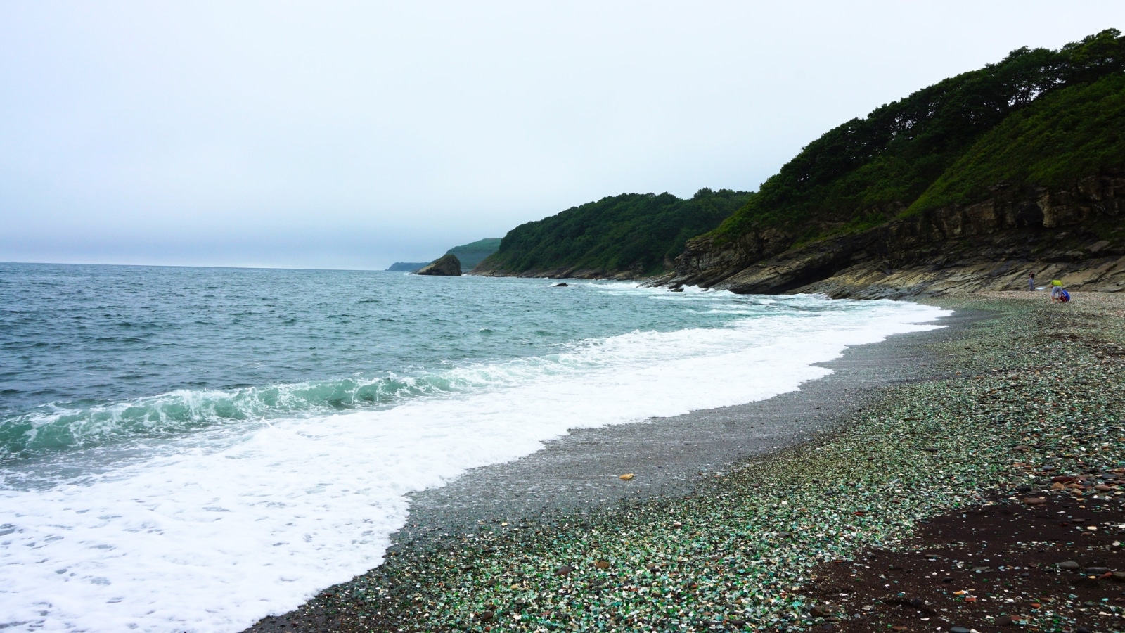 Vladivostok’s Glass Beach, also known as Steklyashka Beach, features a shoreline covered in smooth, colorful glass pebbles. The glass fragments, polished by the sea, create a mosaic of vibrant colors like green, blue, and amber.